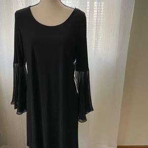 Flowy, strappy, sheer sleeved black dress